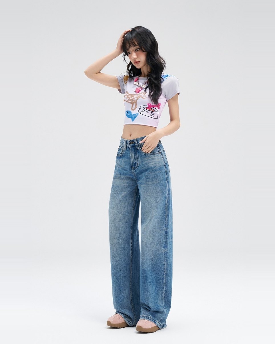 Straight-Leg Jean in mid wash, styled